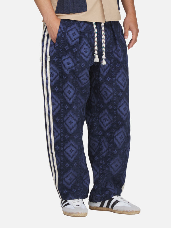 ADIDAS ORIGINALS, CLOT x adidas Ikat Pant - Tech Indigo, PANTOLON, shopi go'da!