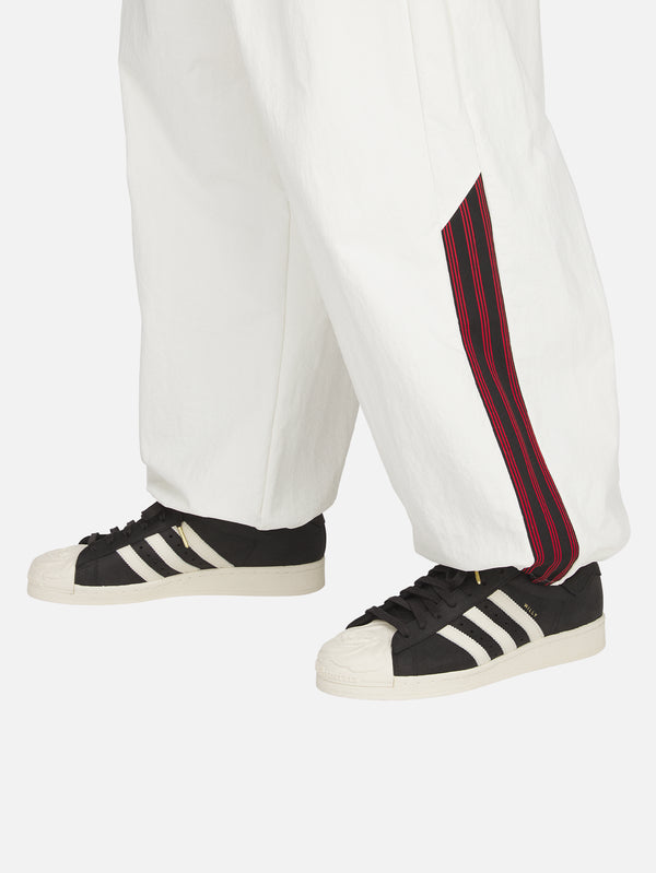 ADIDAS ORIGINALS, Willy Chavarria x adidas Woven Track Pant - Off White, EŞOFMAN ALTI, shopi go'da!