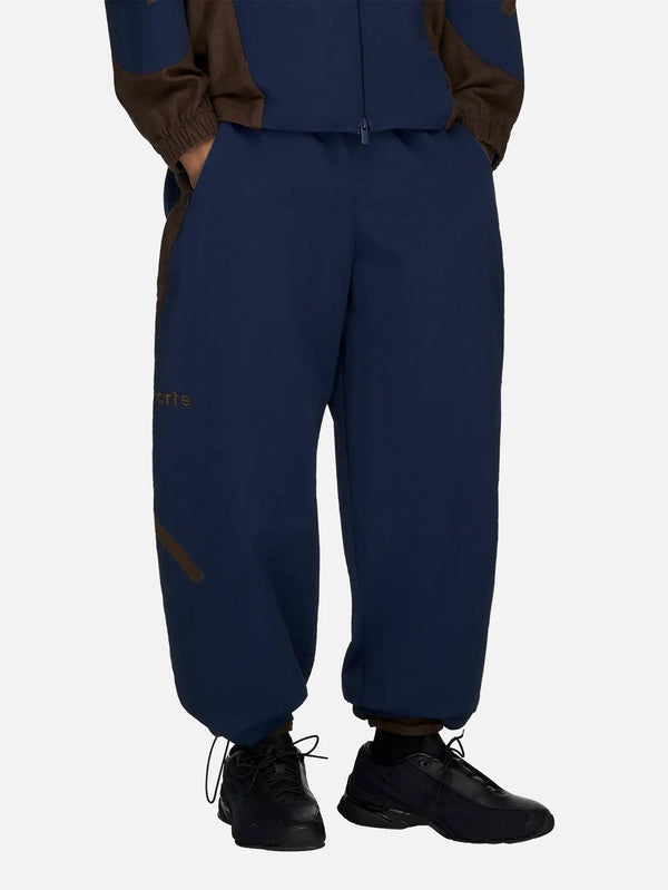 ADIDAS ORIGINALS Arte Antwerp x adidas Z.N.E. Material Mix Track Pant - Collegiate Navy – önden görünüm