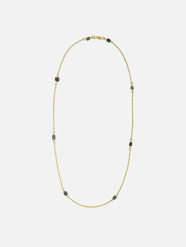 JIN Kyne Necklace – altın rengi, küp taşlı zincir, üstten görünüm