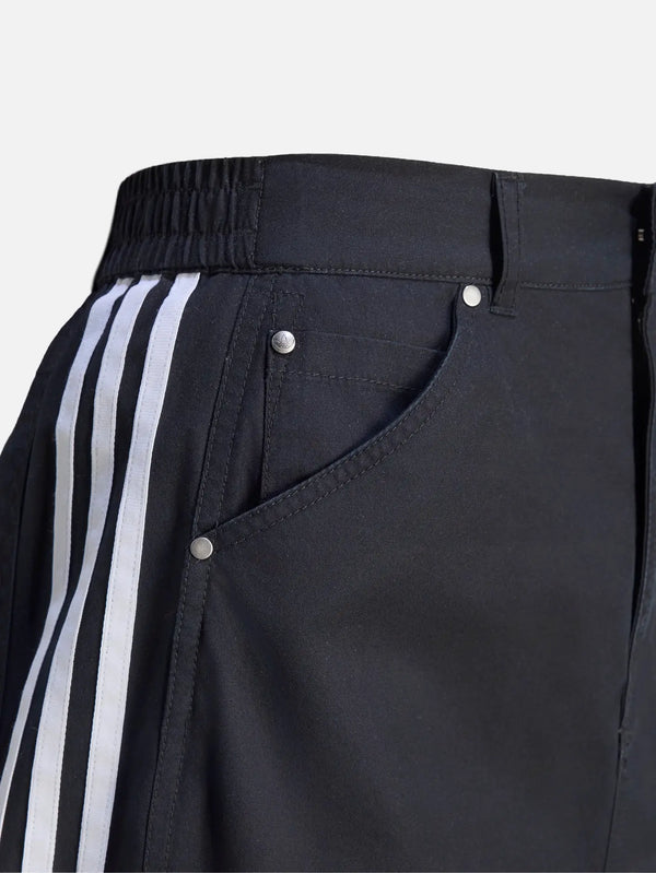ADIDAS ORIGINALS Parachute Skirt – siyah, yan görünüm, elastik bel ve metal rivet detayları